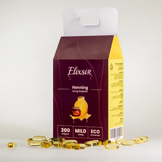 Elixsir Honey box seen at an angle, surrounded by yellow capsules, showing the yellow side and open top.